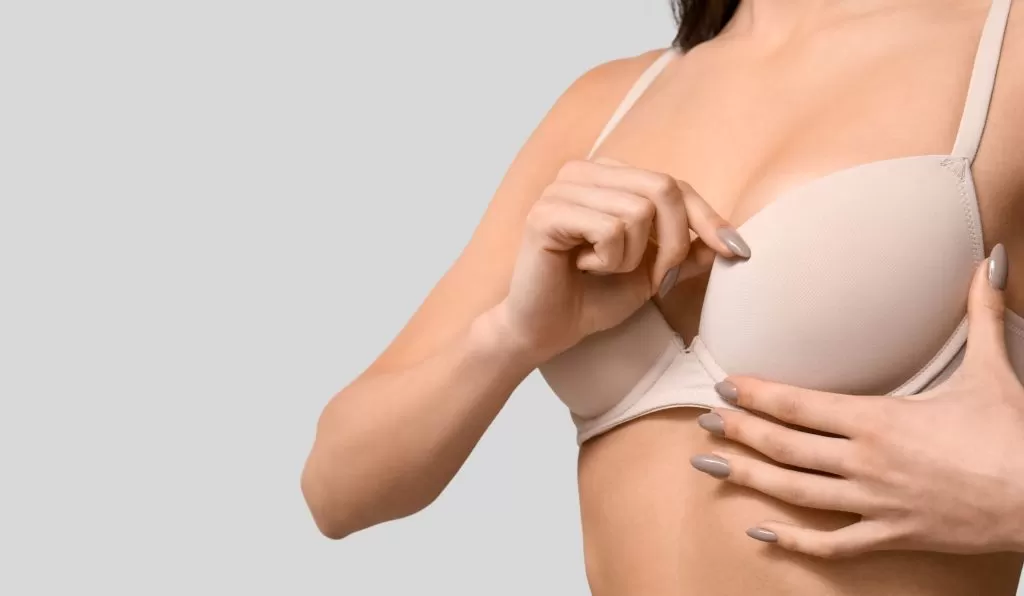 woman wearing a bra for breast lift surgery in Richmond