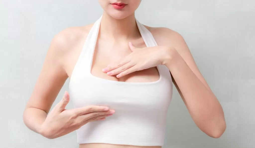 woman considering breast lift surgery in Richmond